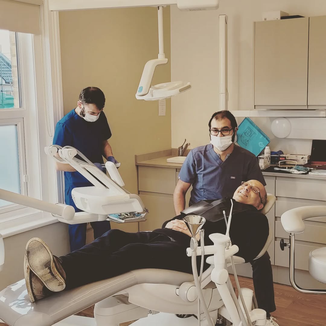 Compassionate emergency dentist with patient
